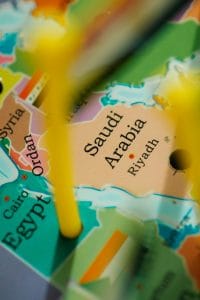 Detailed close-up of a colorful map depicting Saudi Arabia and surrounding countries with emphasis on Riyadh.